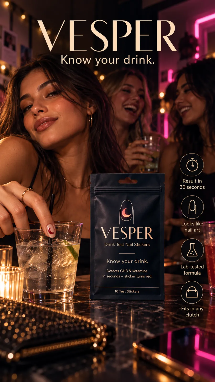 Friends at a bar at night; a Vesper pouch on the marble and a navy nail wearing the crescent sticker
